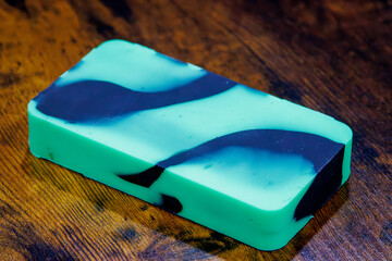 A green and black block of silicone