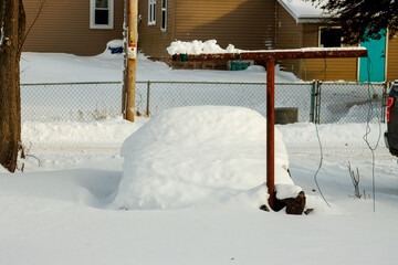 A car covered in snow