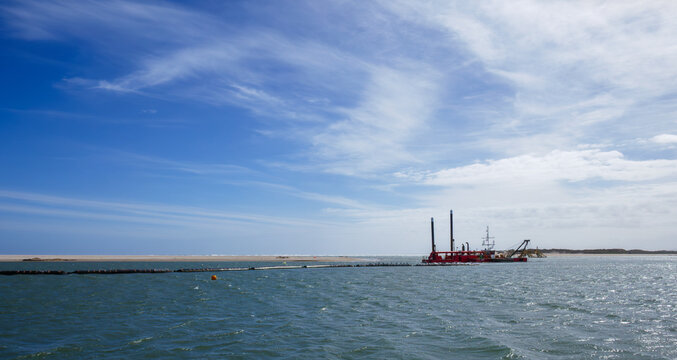 Mouth of the Murray River, South Australia with sand dredger.