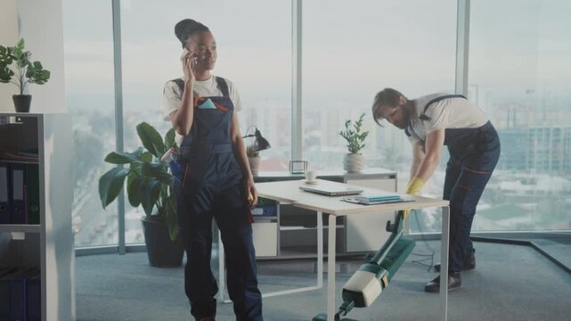 Office cleaning scene, Professional cleaning staff member in contemporary office with scenic city skyline outside