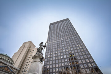 Maisonneuve monument on place d'Armes square in Old Montreal surrounded by skyscrapers. Built in 1895, It is a monument dedicated to De Maisonneuve, the founder of Montreal, Quebec, Canada.