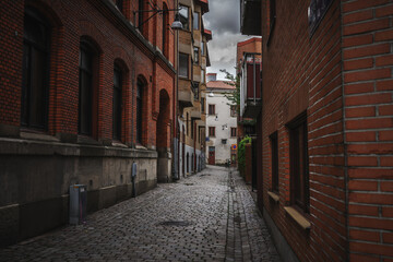 Fototapeta premium narrow cobblestone road in Gothenburg