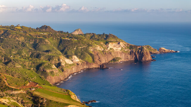 Breathtaking aerial view of the coast and landscapes of Maui Hawaii showcasing cliffs and ocean views during morning sunrise - Powered by Adobe