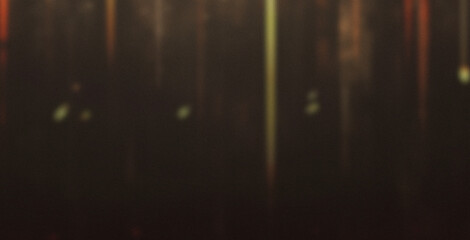 Abstract Vertical Golden Light Streaks on Dark Background