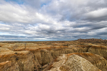 Beautiful landscape at Badlands National Park on a cold and cloudy windy day.	