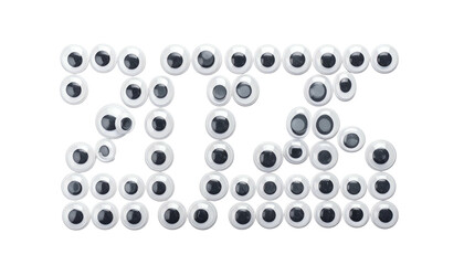 Eyeballs arranged forming "2025" against black background