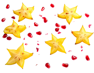 Yellow star-shaped fruit slices and red seeds scattered on black