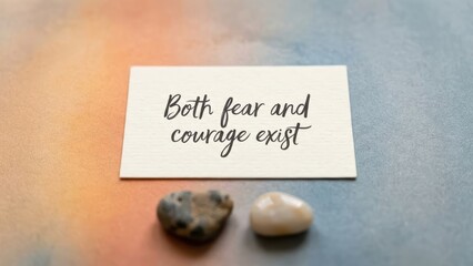 Inspiring message of both fear and courage on a white card