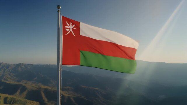 Oman flag waving on mountain peak with stunning landscape view