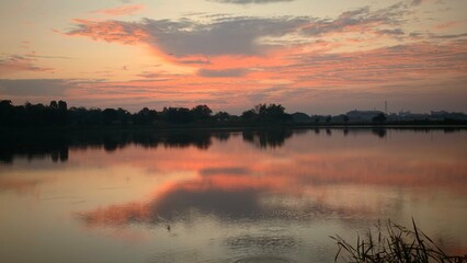 Reflection of the sunset in the lake, Chainat , Thailand