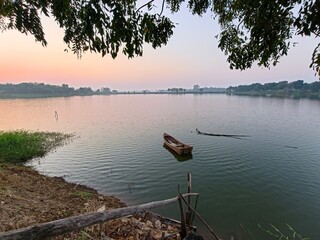 Sunset on the lake in the countryside of Thailand. Beautiful landscape.