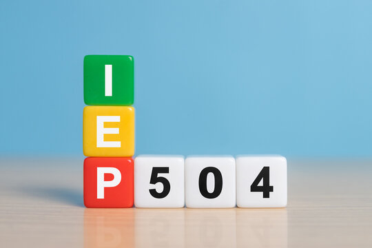 Individual education plan, Business concept, IEP 504 program, copy space, Text on white dice