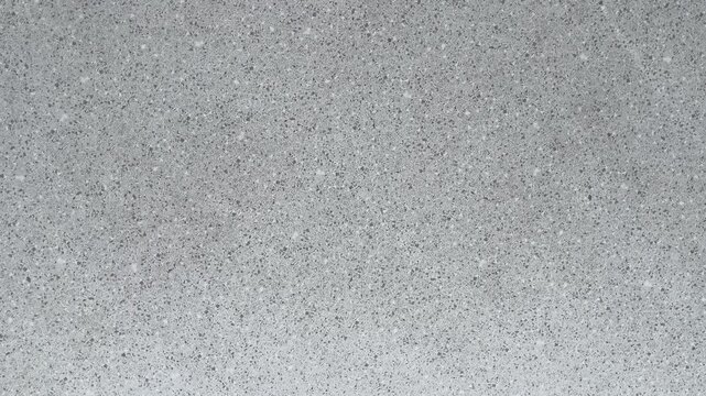 Top view of granite table background. grey or gray. copy space, empty, free, negative, text, design. high angle, above, flat lay. close up. texture, textured. detail, detailed. surface