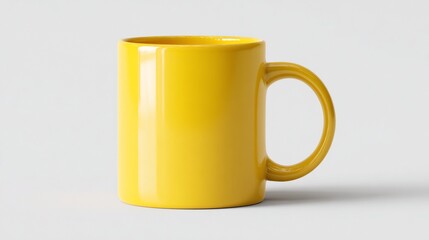 A vibrant, solid yellow ceramic mug, isolated against a plain white background, side view