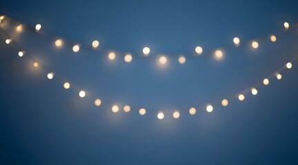 Festive string lights glow against the deep blue sky creating a warm and inviting ambiance