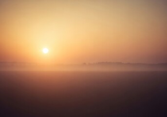 Golden hour landscape with ethereal mist at sunrise for scenic views