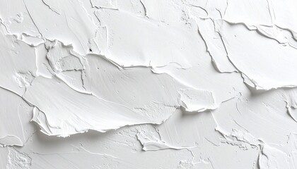 Close-up of thick, textured white paint applied with bold strokes, creating a dynamic surface