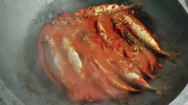 Spicy Indonesian fish stew (Semur Ikan Pedas) braised in sweet soy sauce, chili, and aromatic spices. Authentic Asian seafood dish with a bold, savory, and hot flavor profile.
