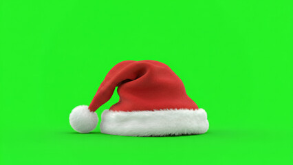 Red Santa hat on a green background viewed from the side with a soft shadow