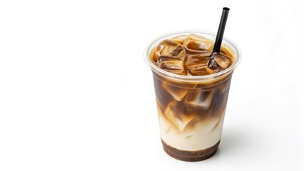 Iced coffee with milk and ice cubes in a clear plastic cup with a black straw isolated on white background