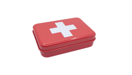 Red first aid kit with a white cross symbol on the top, angled view, medical supplies container, emergency clean white background cutout