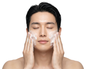 Man Cleansing Face with Facial Foam