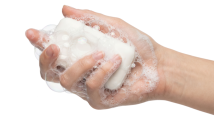 Hand Holding Soap Bar with Bubbles