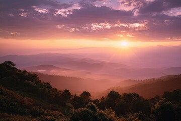 Obraz premium Majestic sunrise over Doi Inthanon National Park showcasing vibrant sky colors and breathtaking mountainous landscape