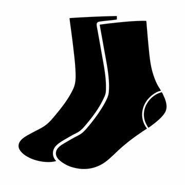 A pair of solid black socks isolated on a white background