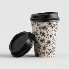 Floral patterned takeaway coffee cup with lid