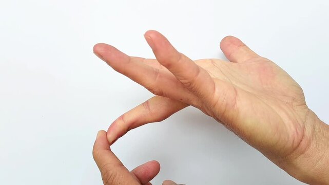 Flex your fingers for one minute to reduce pain and tension in the tendons. Trigger finger therapy.