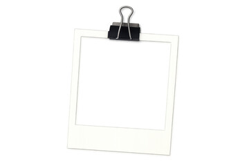 Blank instant camera film frame held by a binder clip, creating a vintage photo mockup with transparency