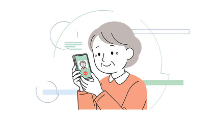 Elderly woman holding a smartphone, engaging in a video call with a loved one