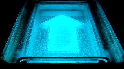 a futuristic holographic display showcases a vibrant blue arrow symbol pointing forward on a modern hightech panel in a dimly lit room