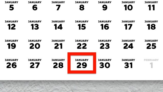 Close-up of the date January 29th marked with a red cursor on the wall calendar 2026