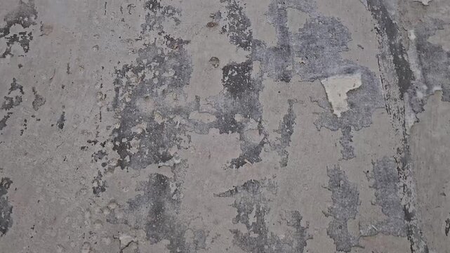 Close view of rough surface textures showing natural wear and weathering patterns from time and environmental effects