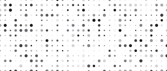 Abstract pattern of randomly sized and shaped dots and hexagons in grayscale