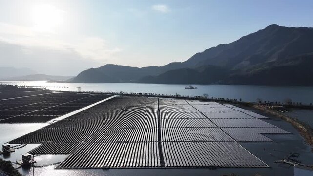 Floating solar farm by mountain lake