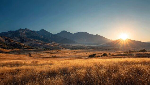 Golden sunrise over a vast mountain valley - Powered by Adobe