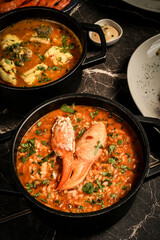 Portuguese traditional food Crab soup risotto meal on restaurant table in lisbon
