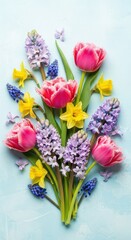 Vibrant Spring Flower Bouquet on Light Blue Background