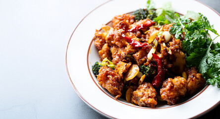Fototapeta premium Spicy Seasoned Chicken on a Plate
