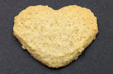 Heart-Shaped Cookie on Dark Background