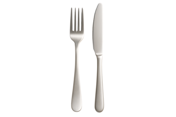 Stainless steel fork and knife cutlery set isolated on black background representing elegant dining utensils for modern restaurant table setting and classic kitchen silverware concept