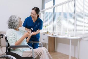 female therapist gives medication advice to a senior old patient in a medical clinic. therapy, wellness, and consultation visuals.