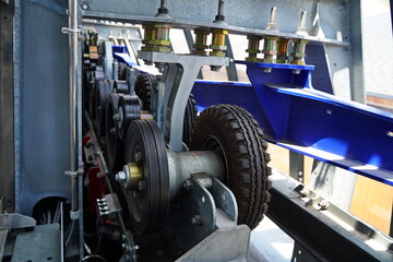 Fototapeta premium Almaty, Kazakhstan - 06.25.2025 : A system for fastening and moving cables on a cable car.