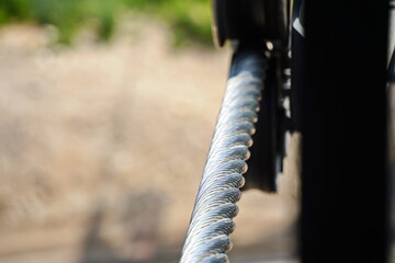 A large metal cable for holding the cabins on the cable car. © Vladimir
