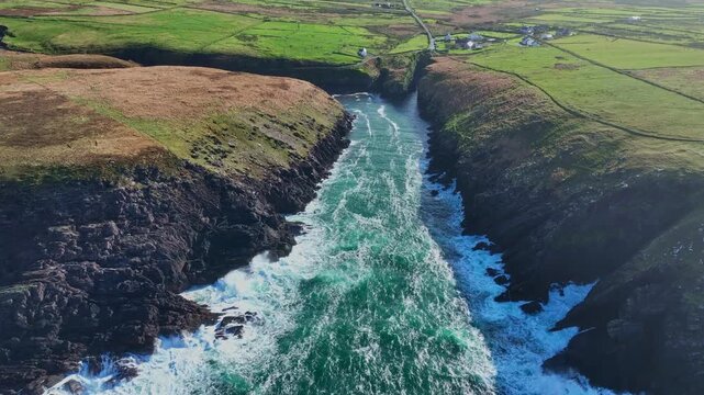 Wild Ireland drone flying up Brandon creek in Atlantic storm Kerry landscapes