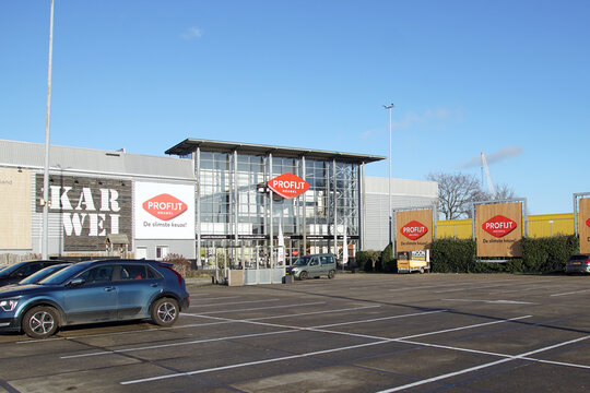 Dutch hardware store Karwei and furniture store Profijt Meubel with a parking space for visitors in Broek op Langedijk, Netherlands. Winter, December.