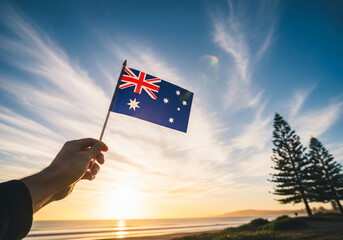 Holding the Australian flag during a golden sunset